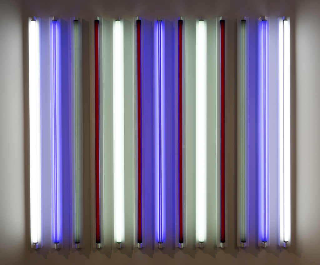 Here, the 13 evenly spaced tubes emit 6 different colors, with 4 on/off, user-controlled configurations. The custom-mixed colored gels are named after natural flora, including jade, violet, orange and avocado.
