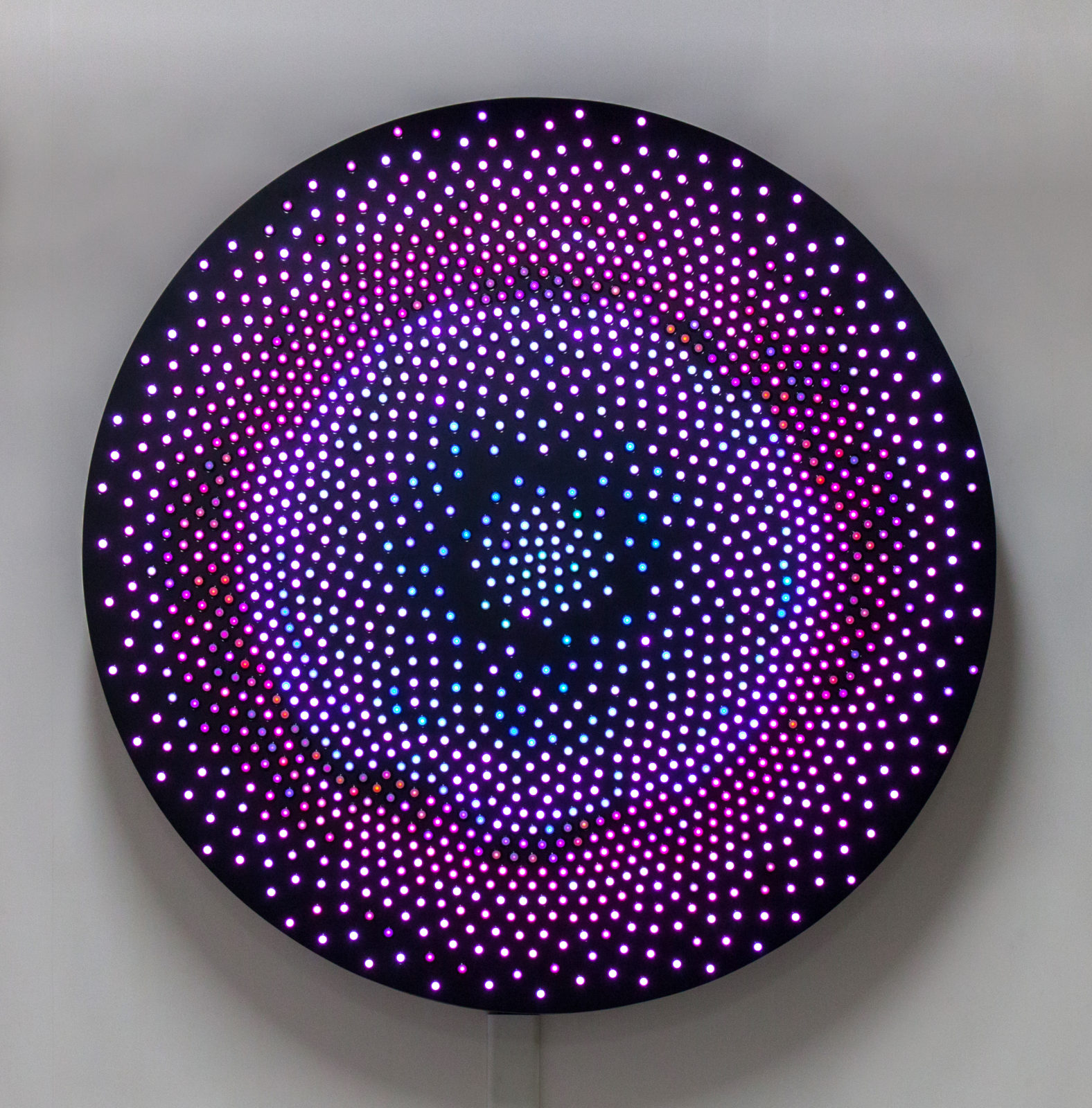 Big Bang uses 1,600 LEDs and a generative algorithm to produce a whirling constellation of light in an infinite pattern evoking planetary formation.